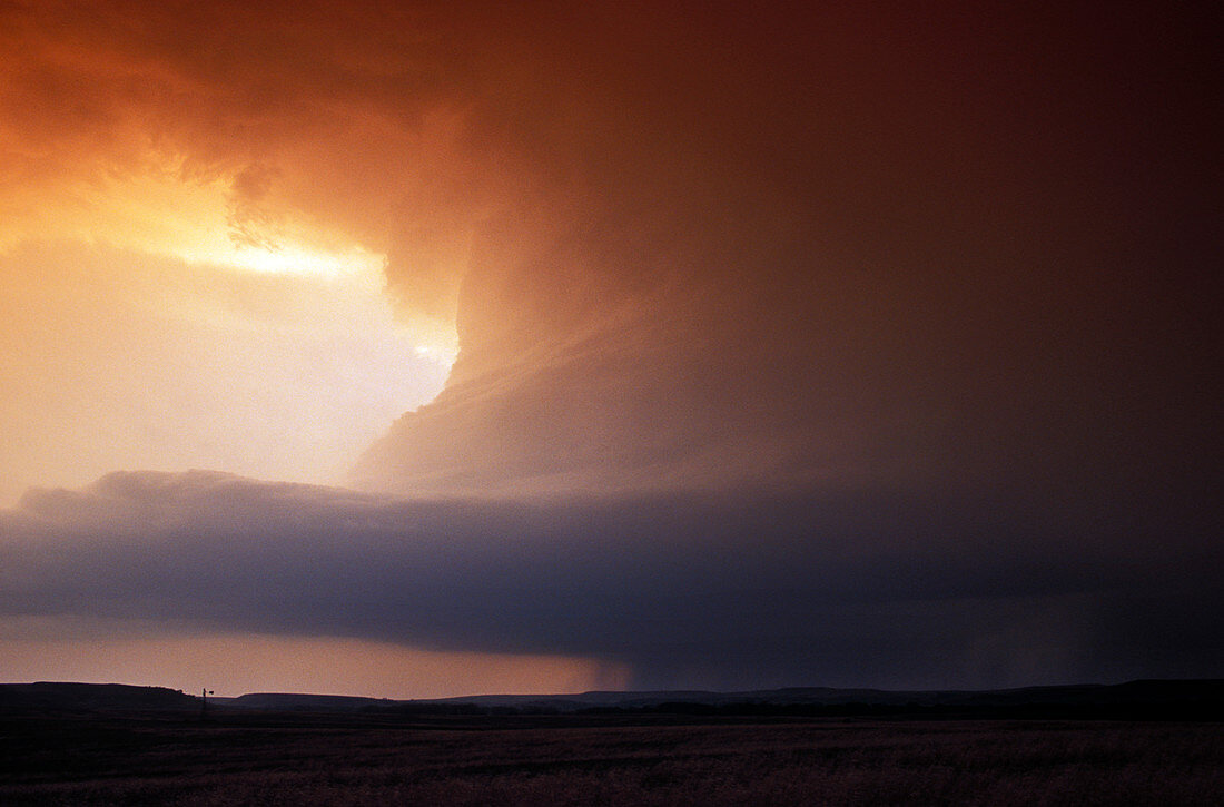 Tornado forming at sunset