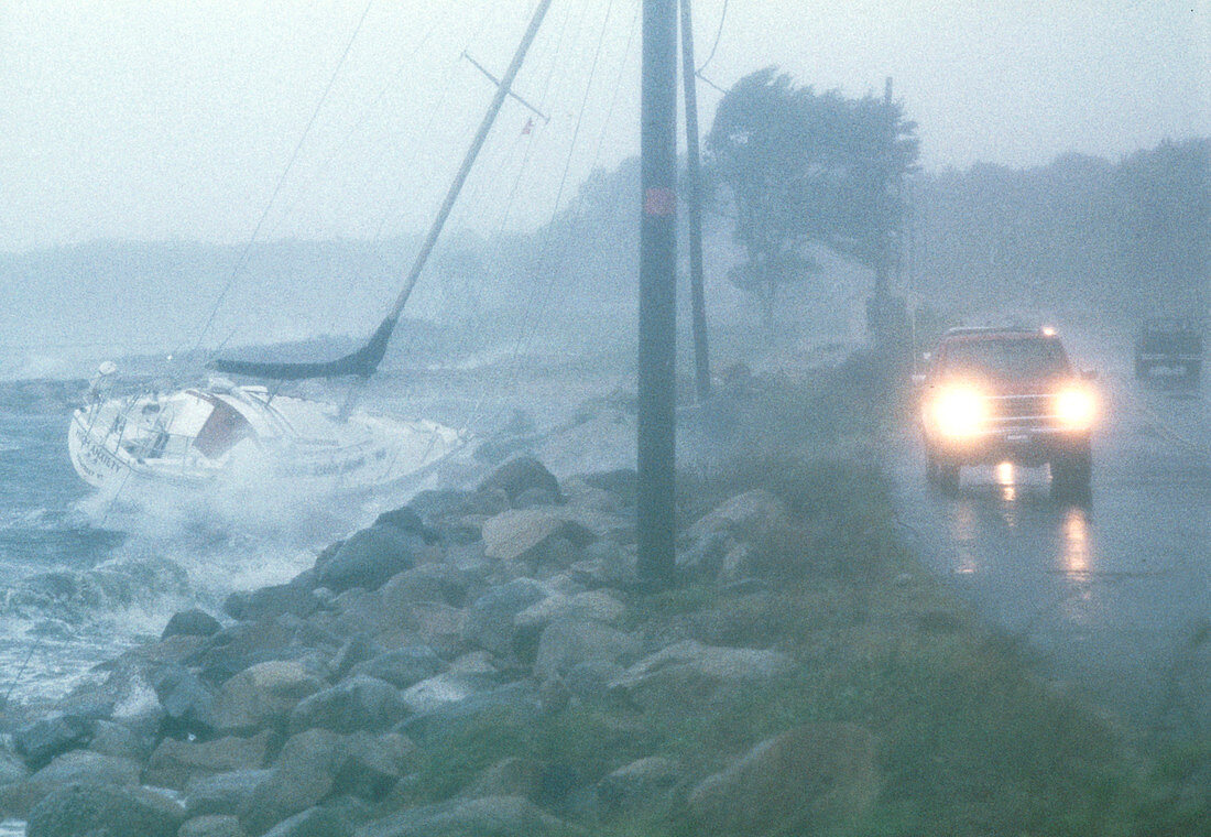 Yacht thrown onto rocks by Hurricane Bob