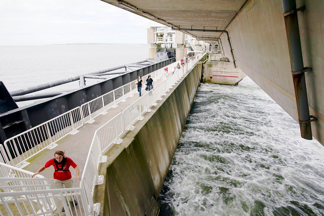 Tourists on a flood barrier,Netherlands