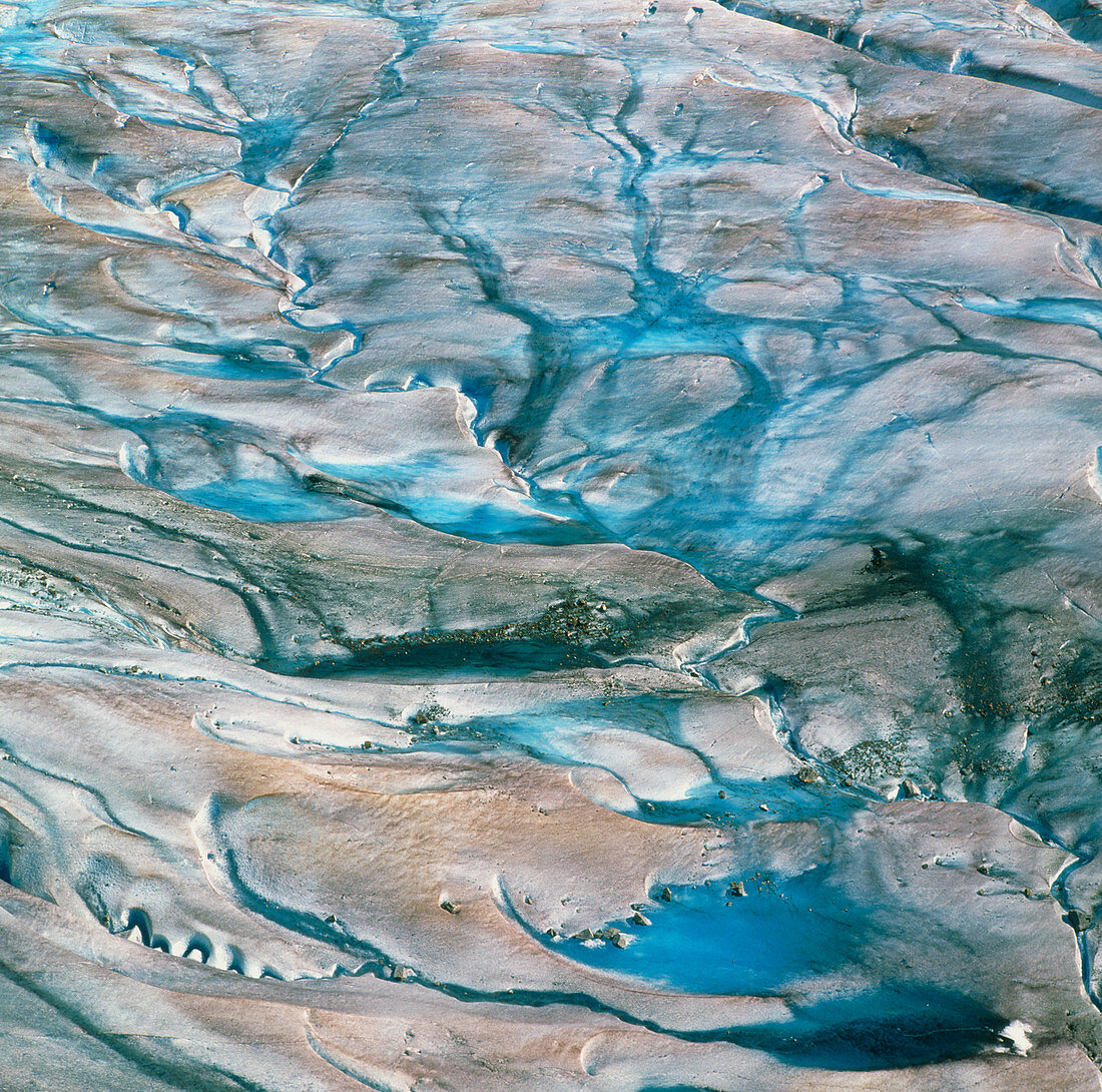 View of meltwater streams on a glacier
