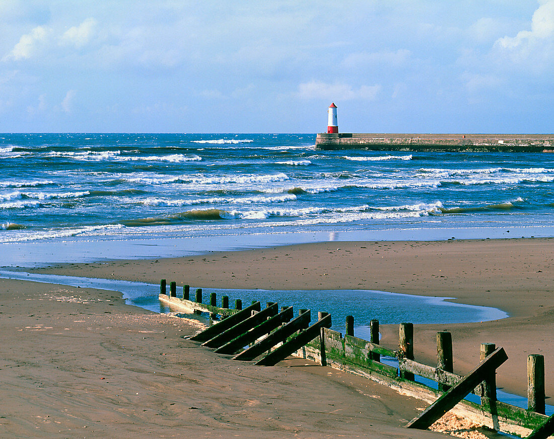 Waves,beach & lighthouse