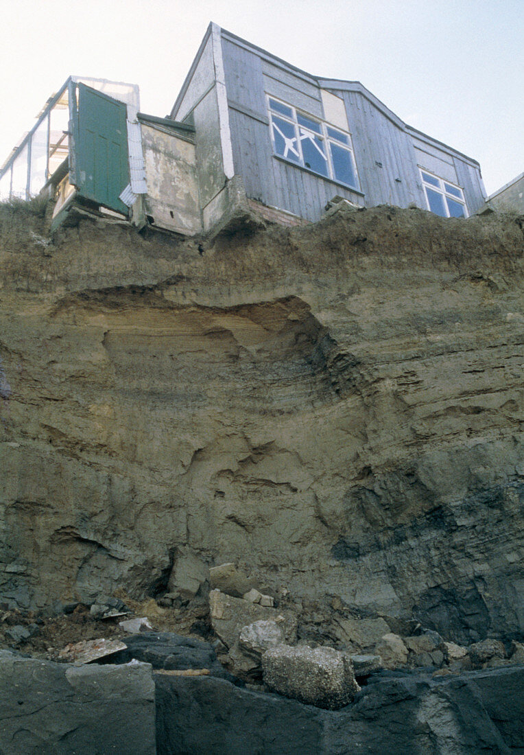 House located at the edge of a sea eroded cliff