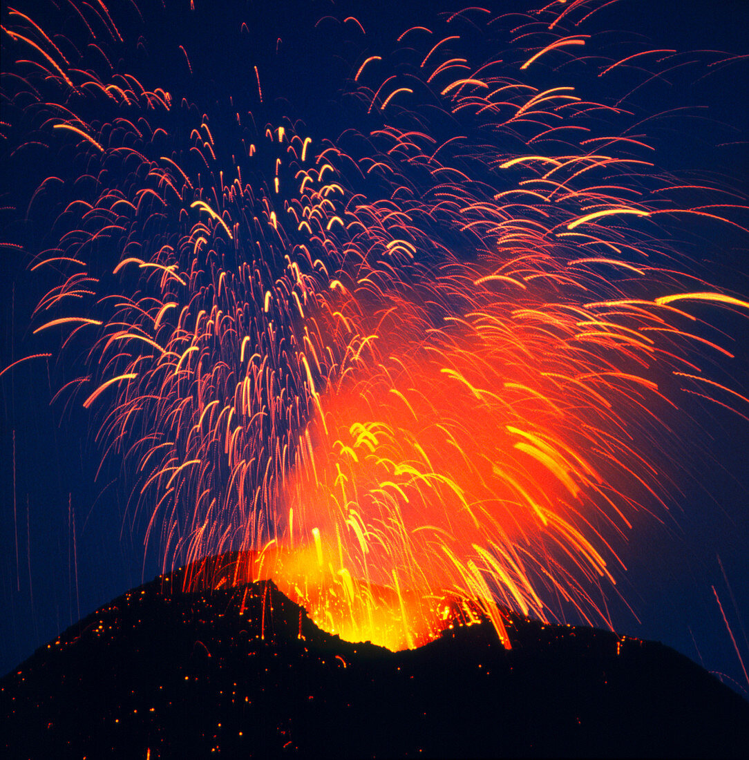Mount Etna erupting at night