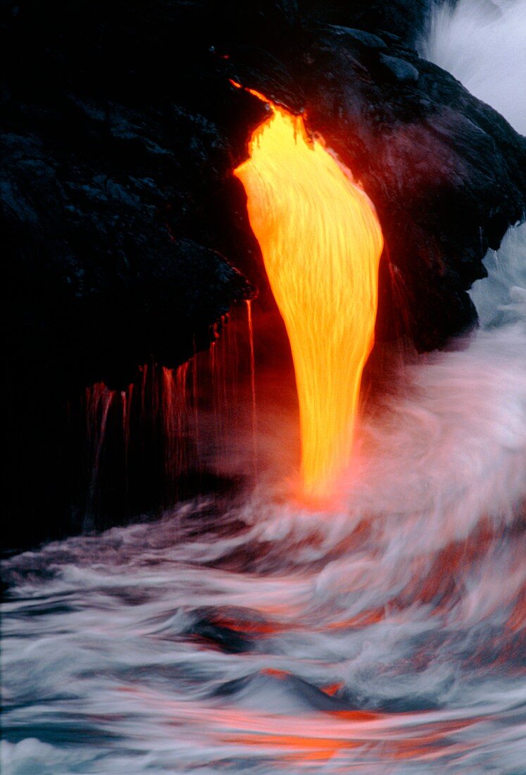 Lava tube emptying into the sea off Hawaii