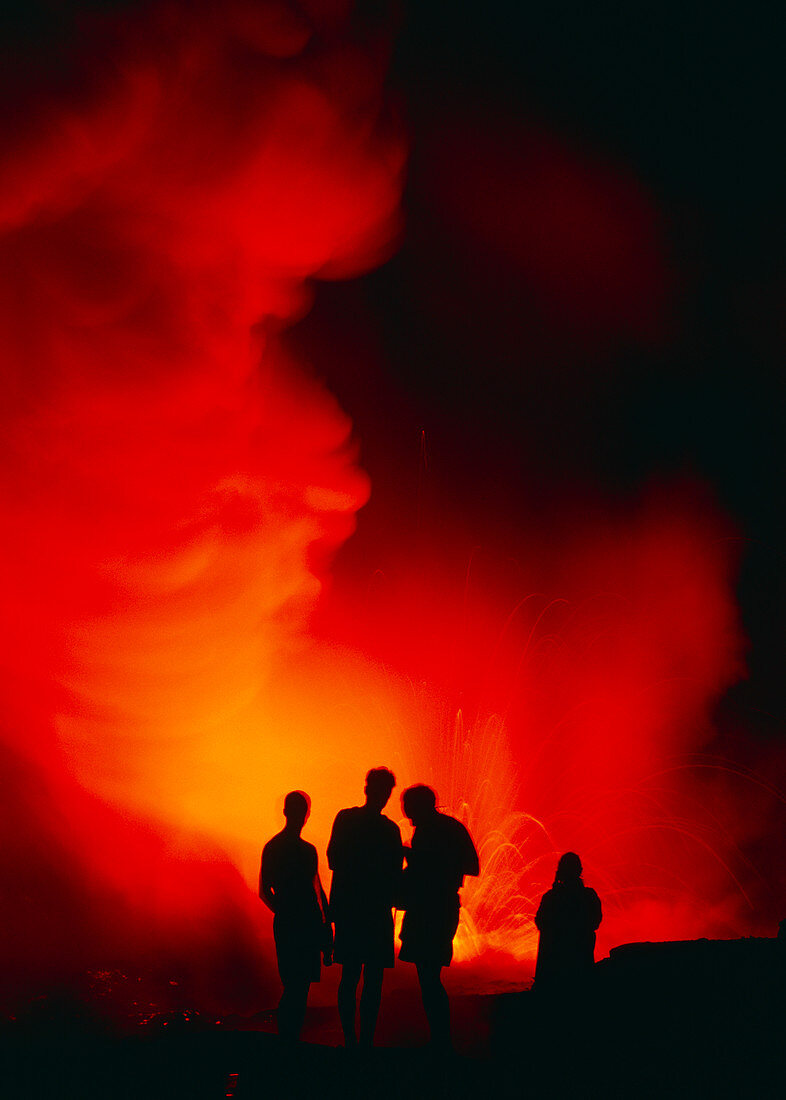 People watching a lava flow,Hawaii