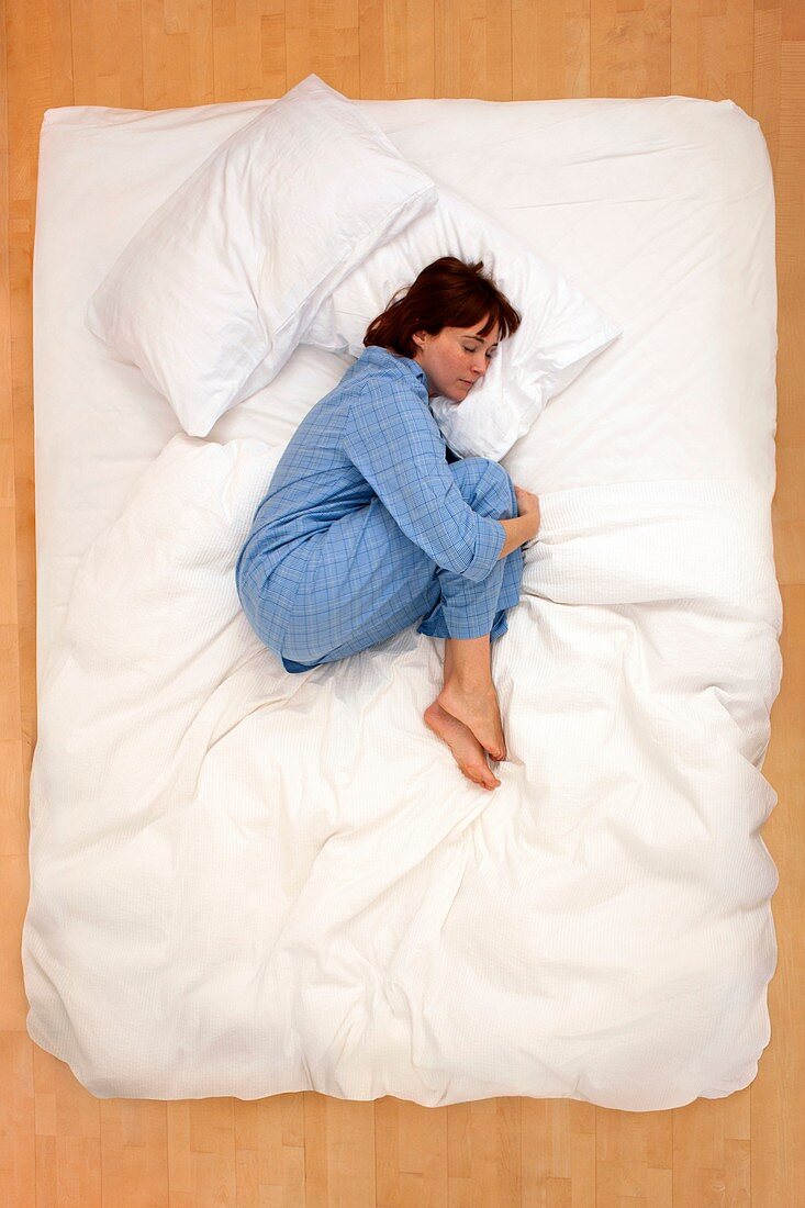 Woman lying in bed,asleep