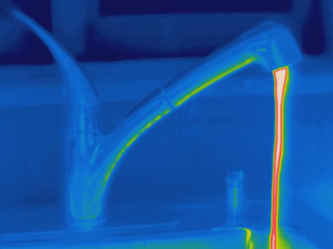 Thermogram of hot water and a faucet