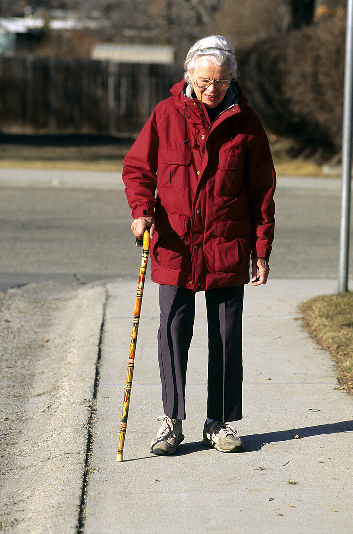 Elderly Woman with Cane