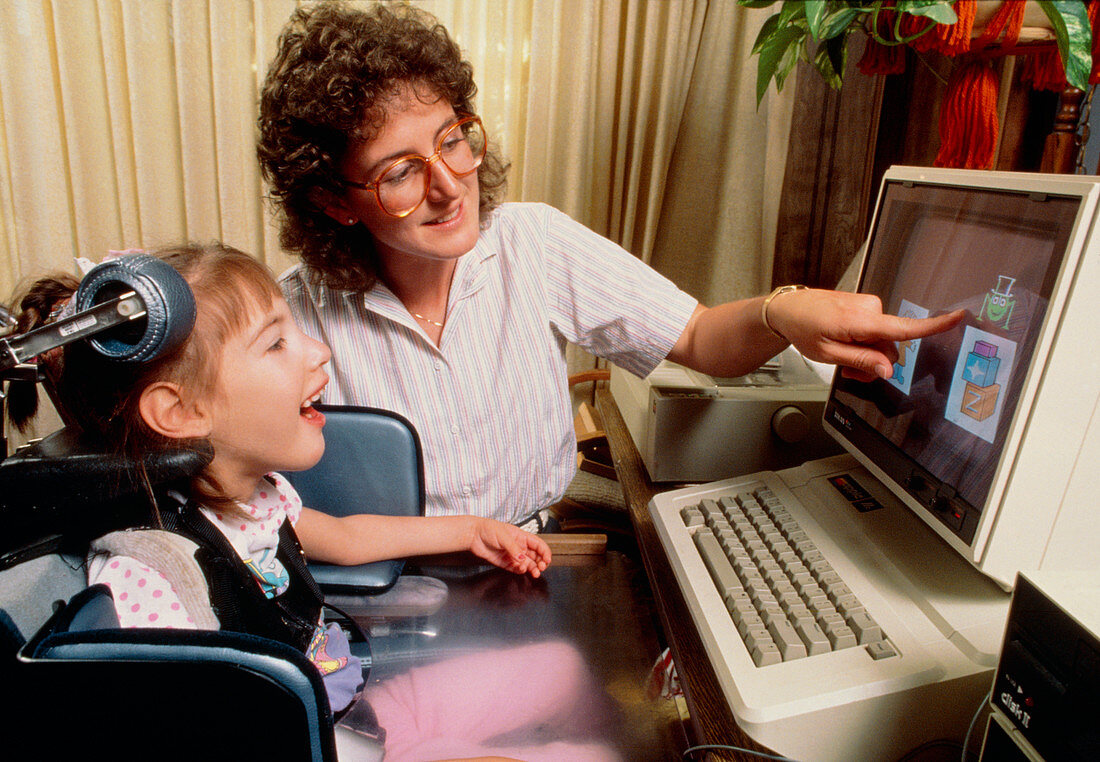 Disabled girl educated with computer