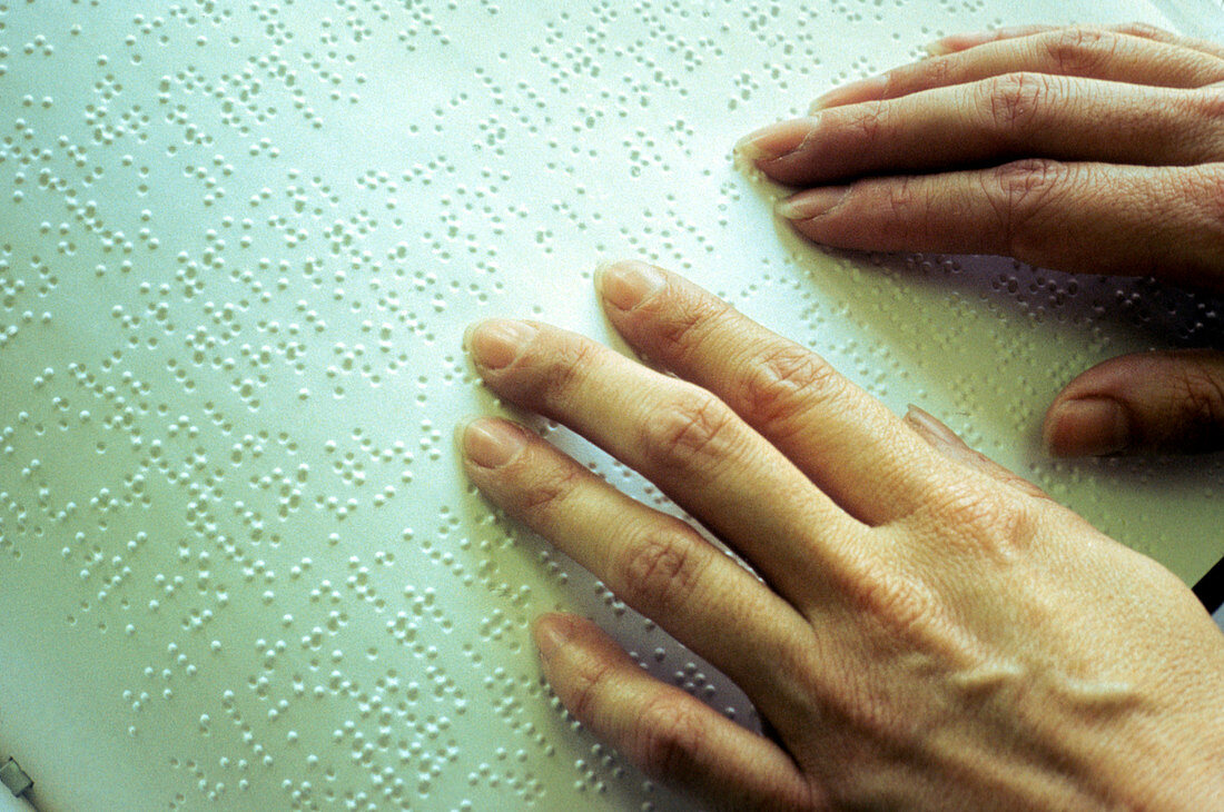 Blind person reading braille,with fingers