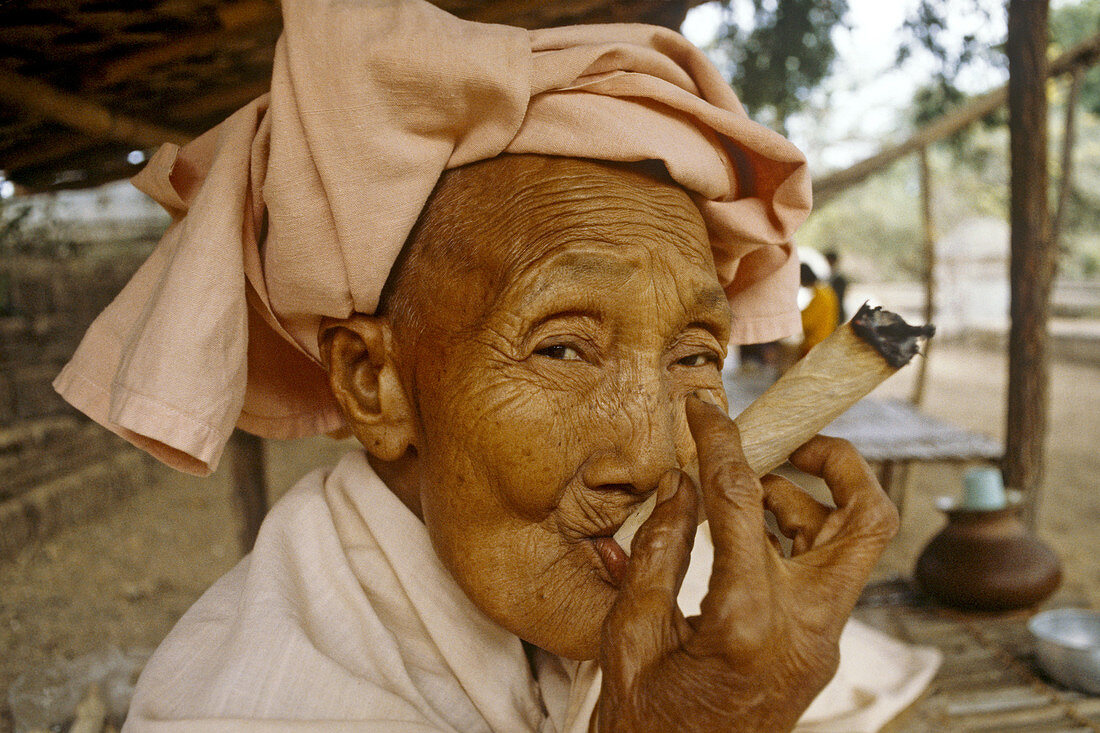 Buddhist Nun Smoking Cheroot