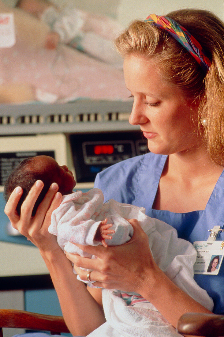 Nurse and baby in intensive care unit