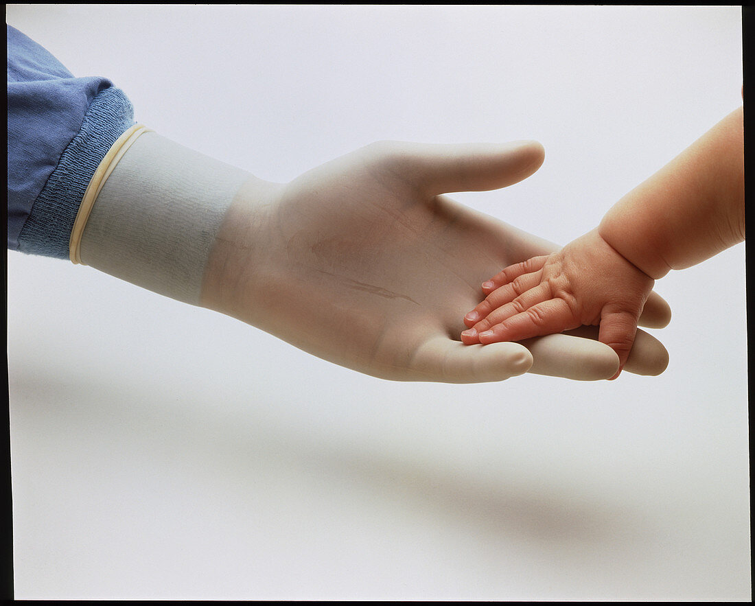 Baby & doctor hands