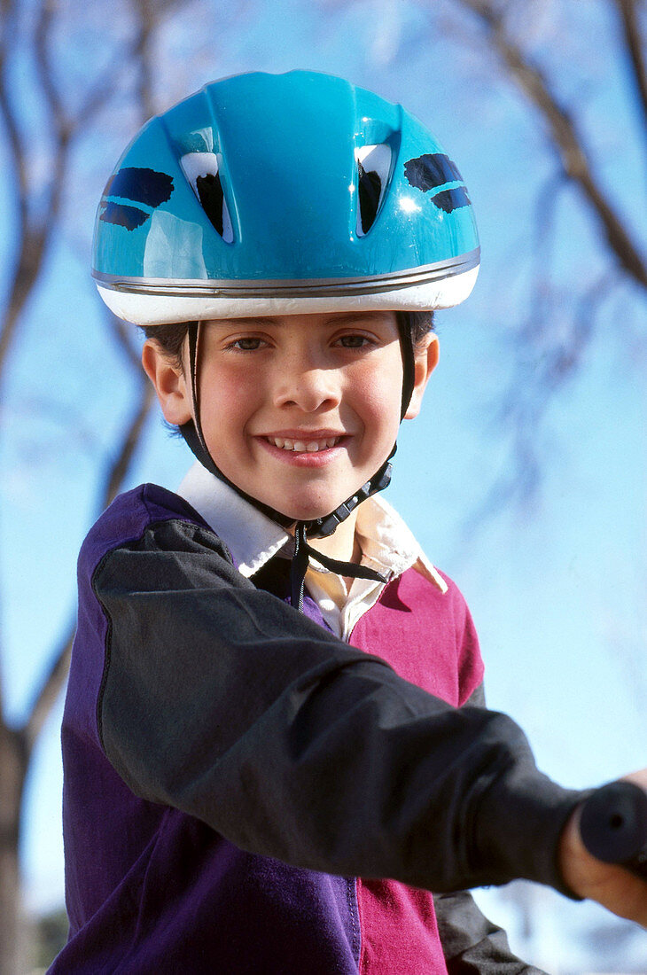 Boy in bicycle helmet