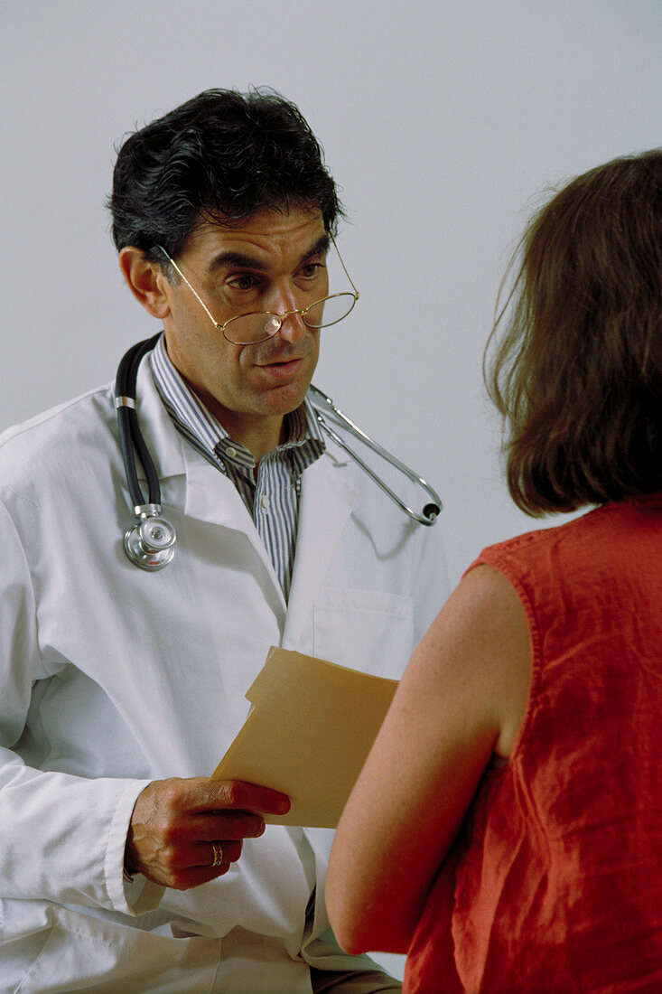 Doctor consults with patient