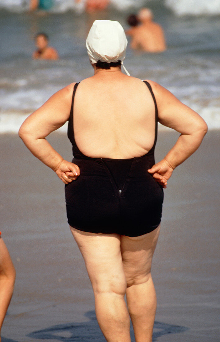 Woman standing on a beach