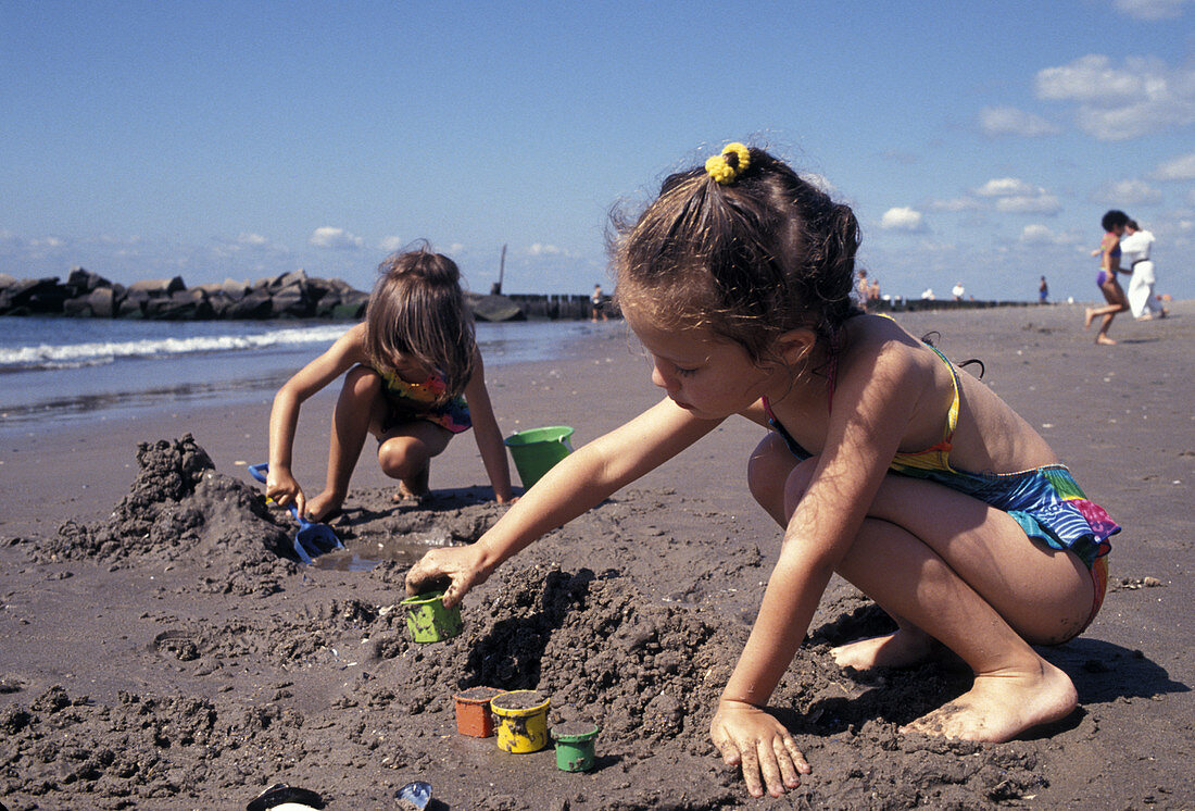 Children Making Sand Castles