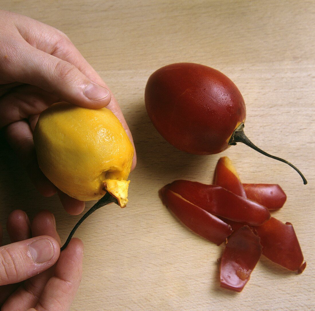 Preparing tamarillo (peeling and removing stalk)