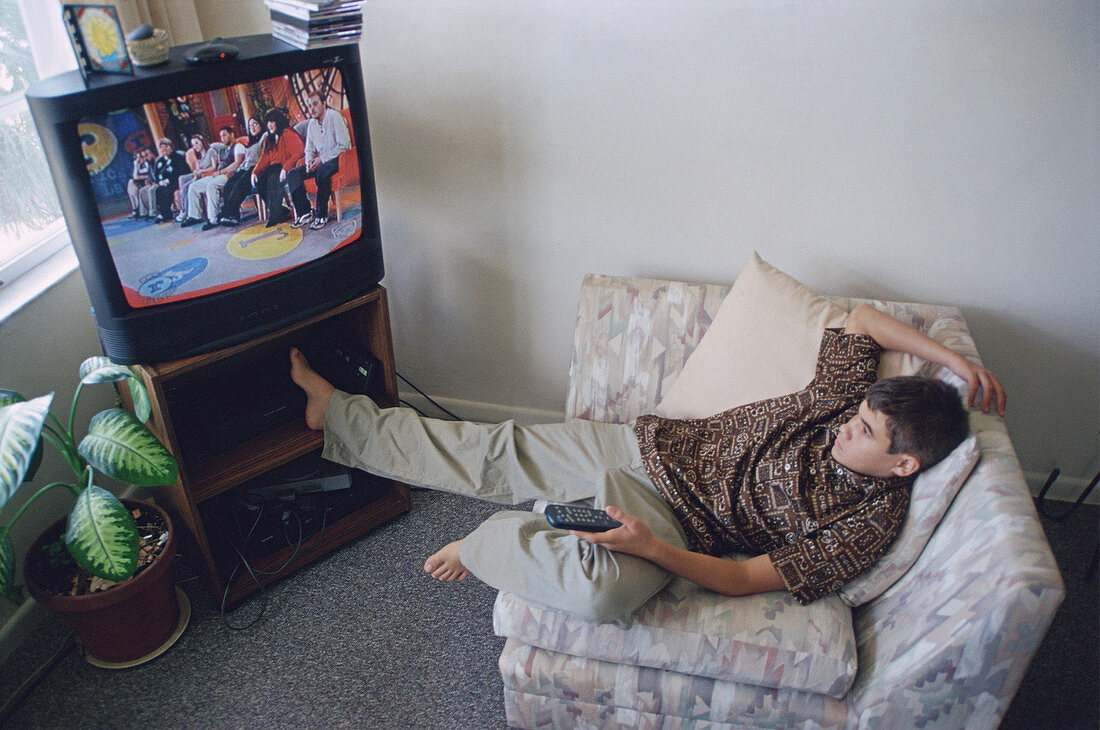 Teen watching television