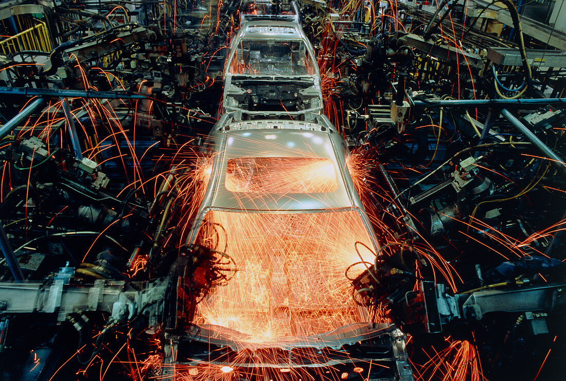 Robots welding in a car body production line