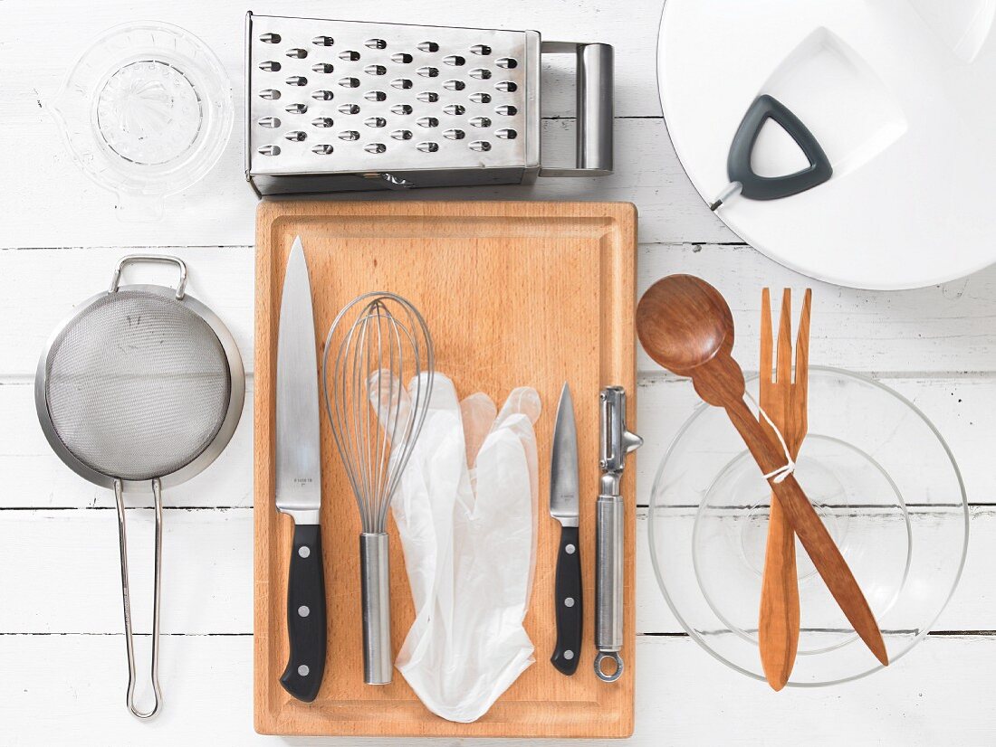 Assorted kitchen utensils for preparing salads