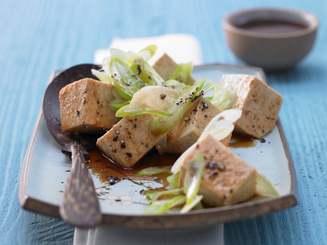 Steamed silk tofu with ginger and spring onions
