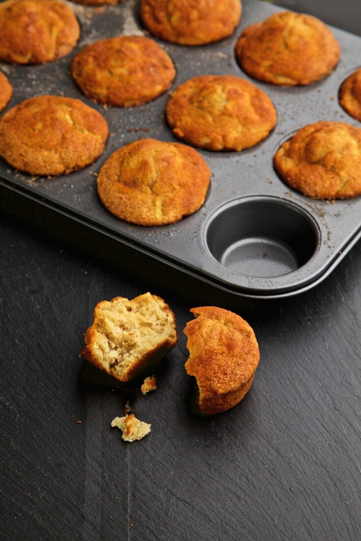 Cinnamon and apple muffins on a dark background