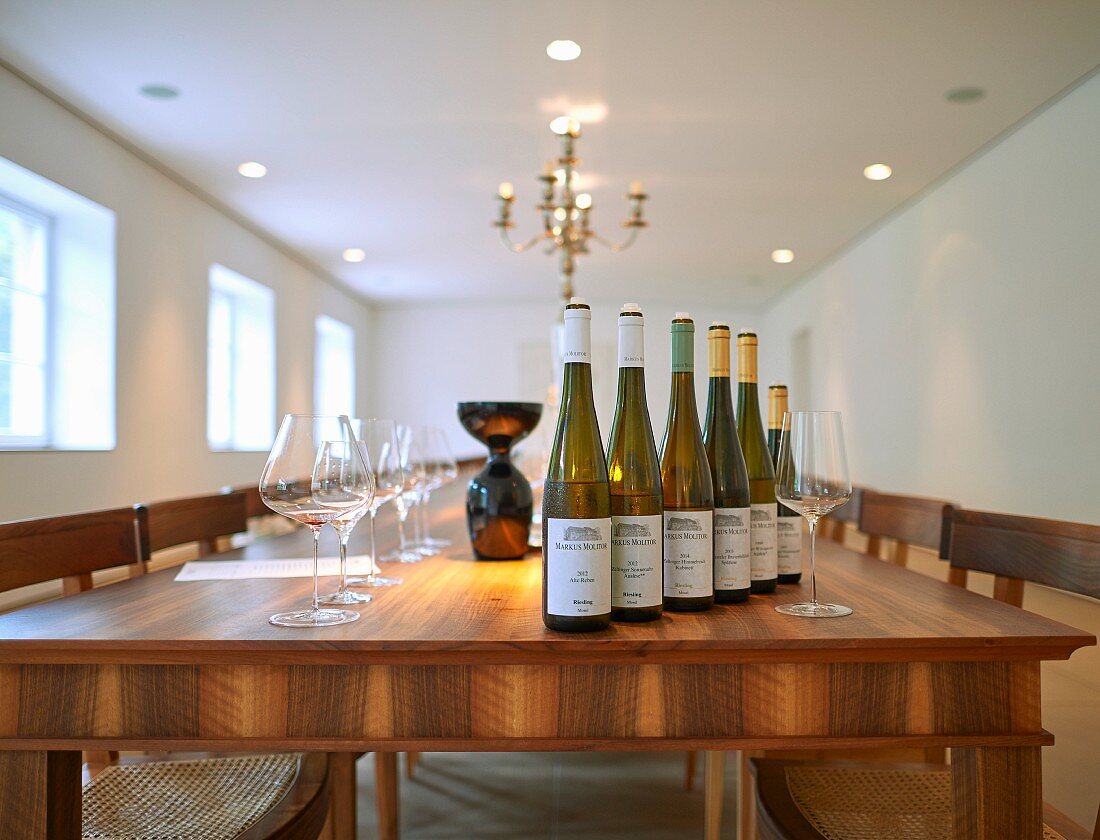 A long table ready for a wine-tasting session in the manor house of the winemaker Markus Molitor
