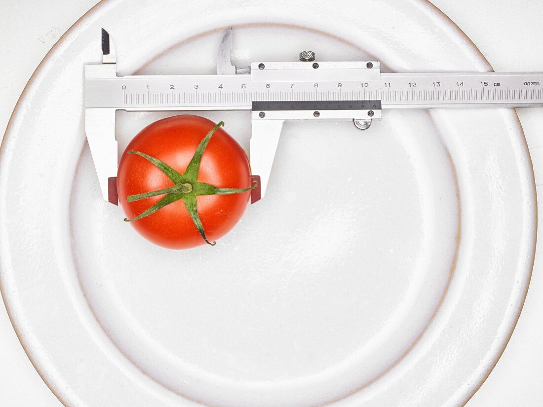 A tomato with a precision ruler