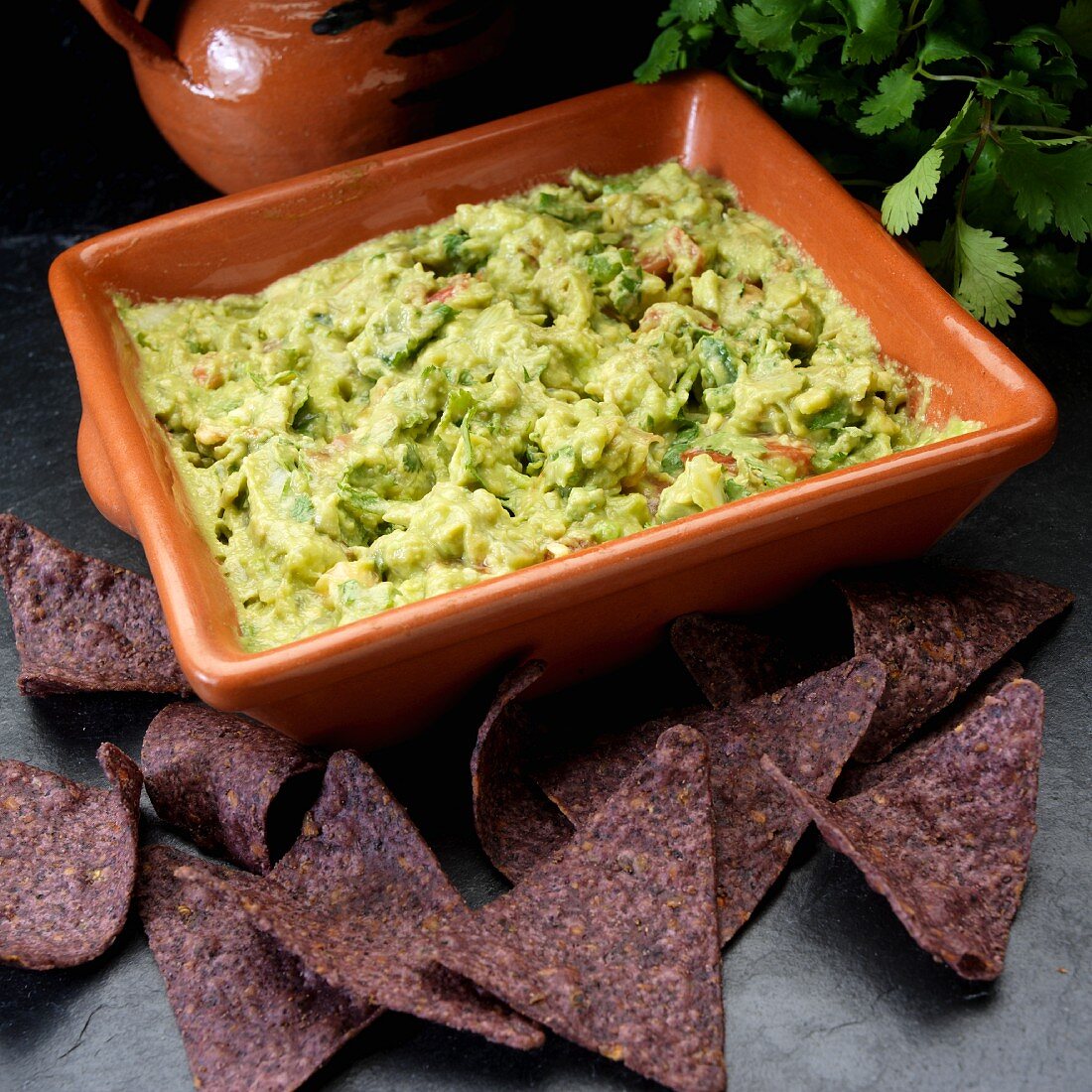 Guacamole with blue corn chips