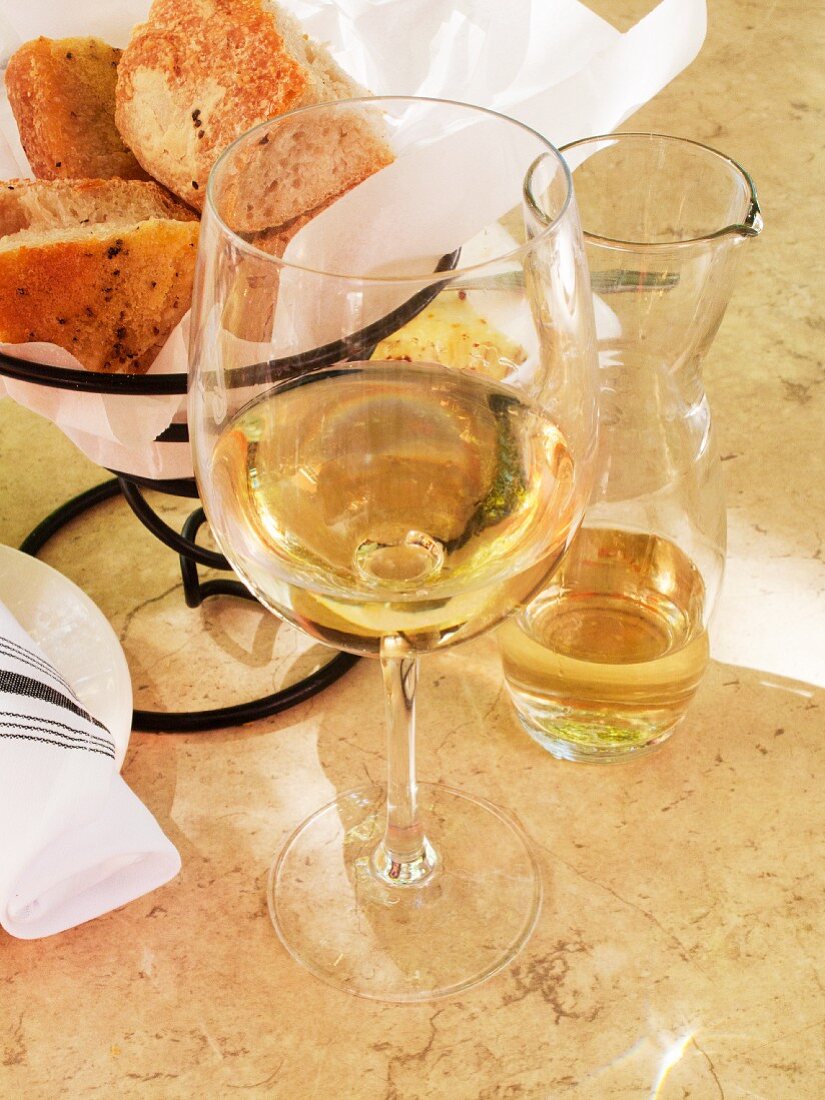 A glass of wine and home-made bread