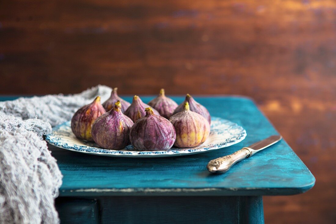 Fresh figs on a wooden table