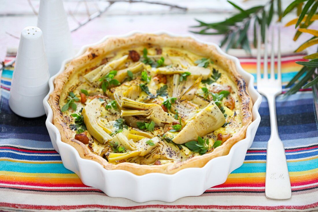 A quiche with artichokes and herbs