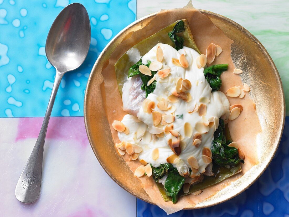 Rose fish and spinach bake with flaked almonds