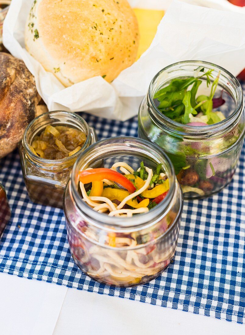 A picnic with pickled vegetables and bread