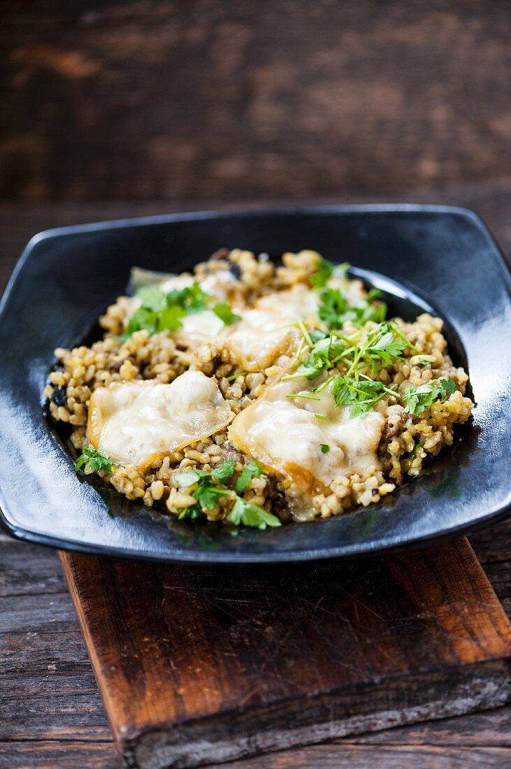 Risotto mit Kurkuma, Pilzen und Käse