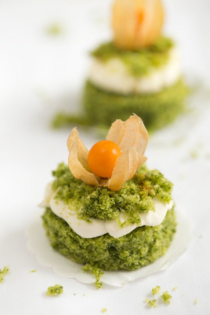 Sweet spinach cakes with cream and physalis