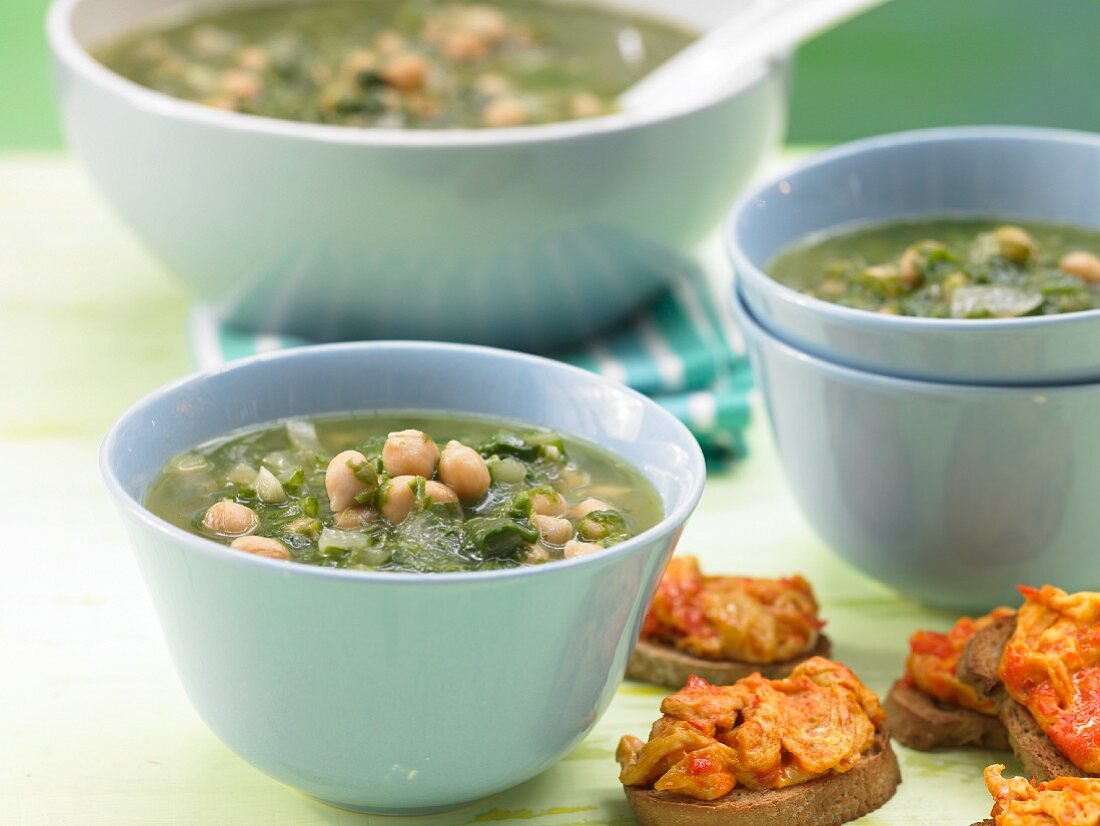 Green chickpea soup with scrambled egg crostini