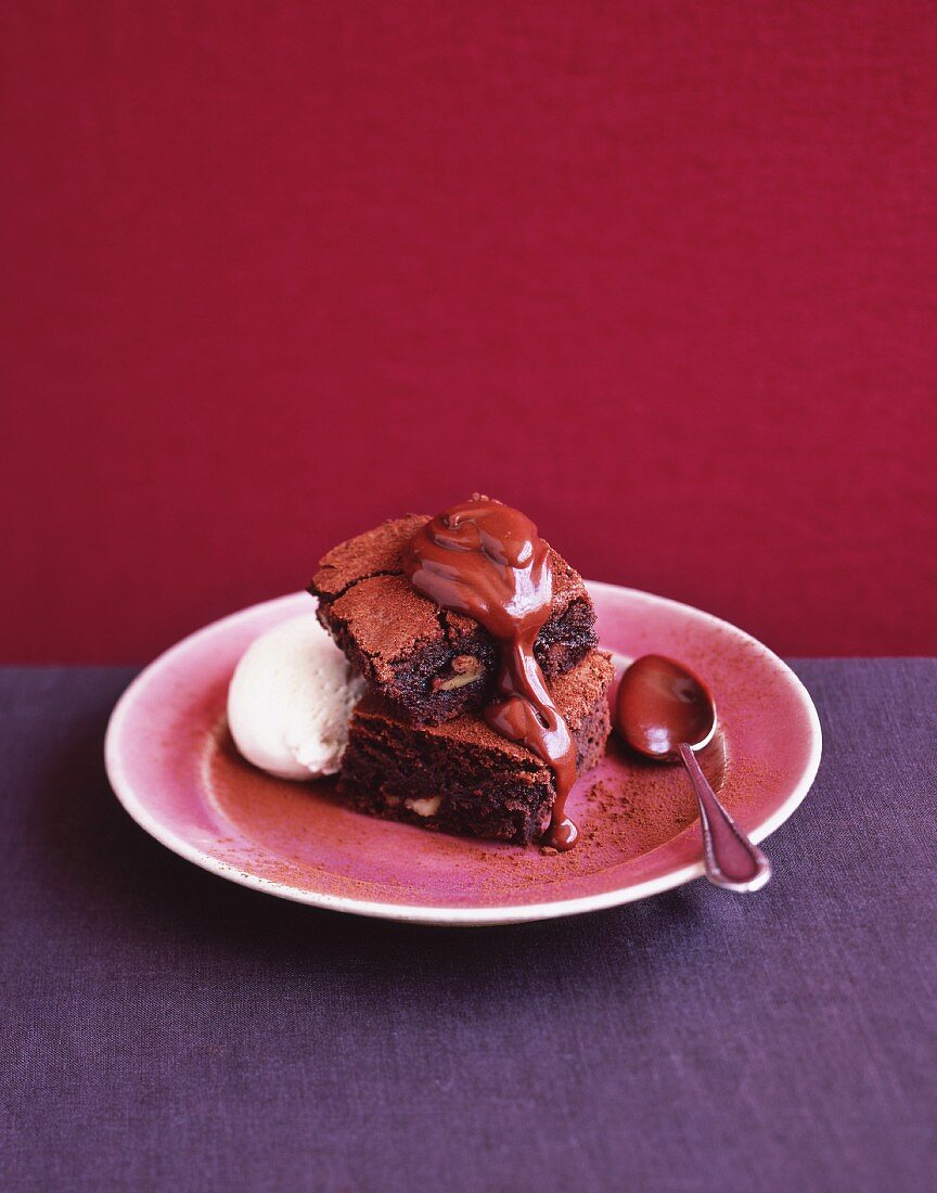 Brownies with chocolate sauce and ice cream