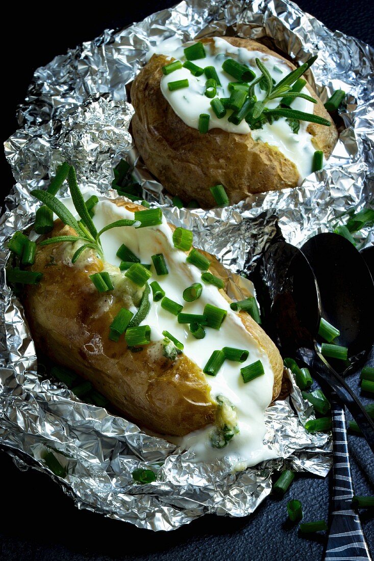 Baked potatoes with yoghurt dip and chive rolls