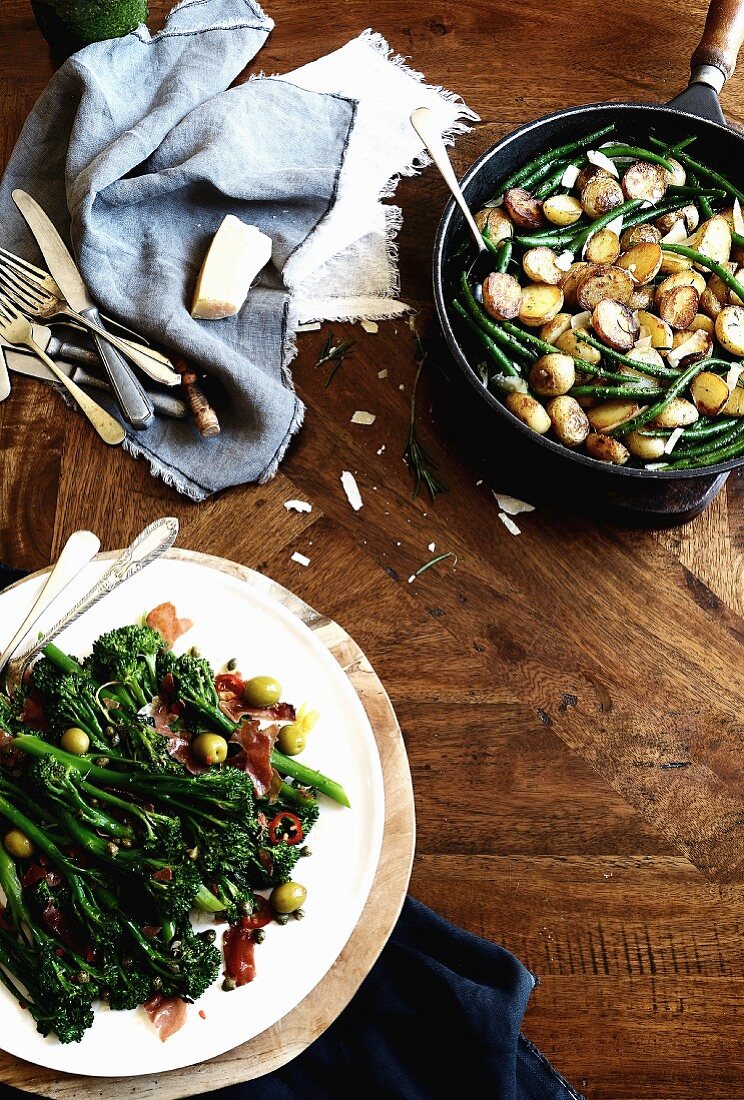 Pan-fried potatoes with green beans and pesto and broccolini with crispy Prosciutto