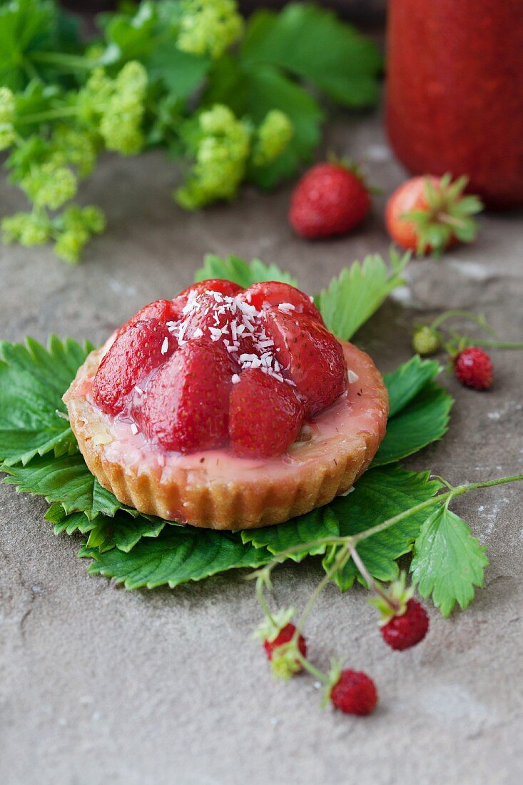 Strawberry tart with shaved coconut