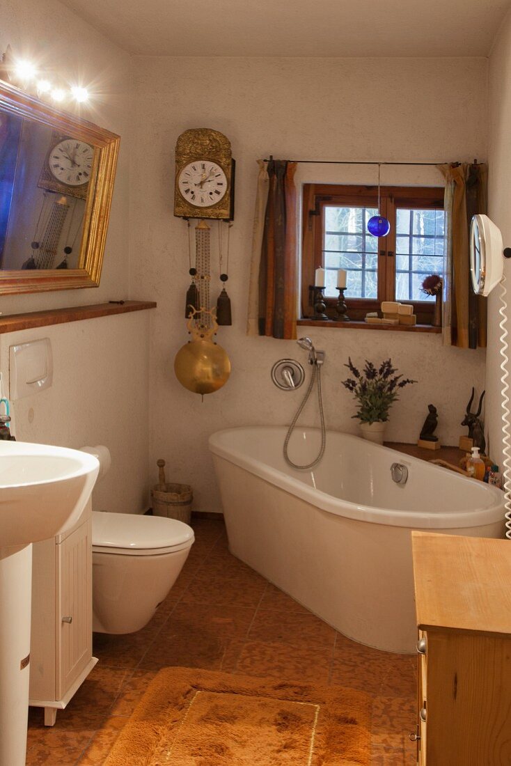 Mixture of old and new elements in bathroom of historical farmhouse