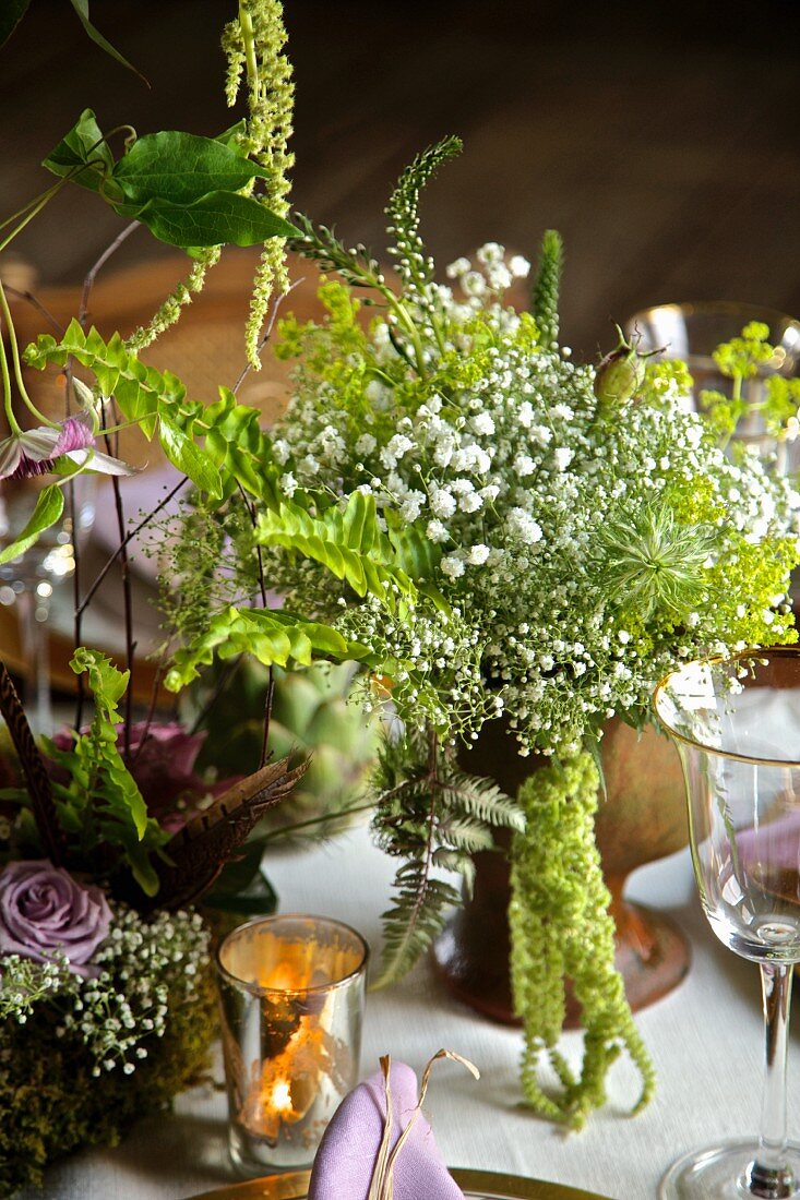 Bouquet with gypsophila on set table