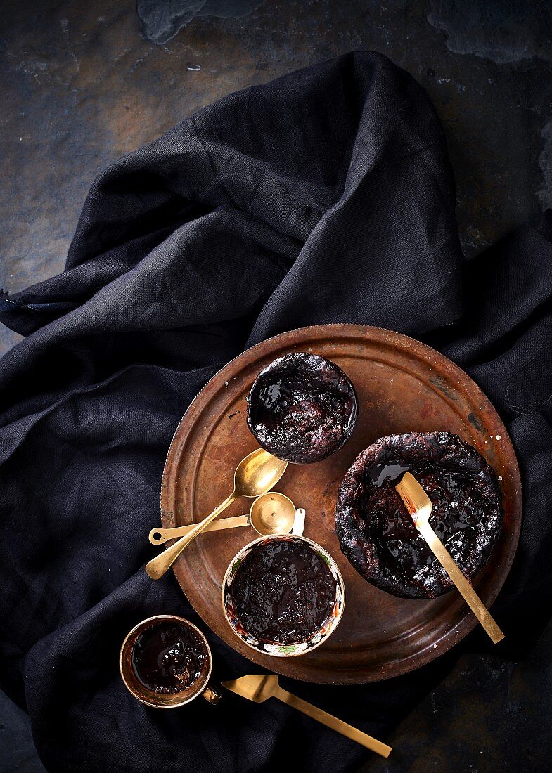 Self-saucing chocolate puddings with hazelnuts