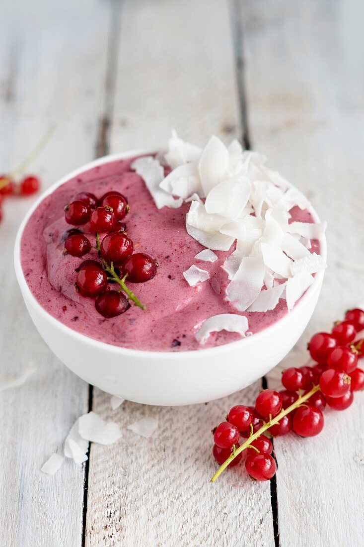A smoothie bowl with berries and coconut