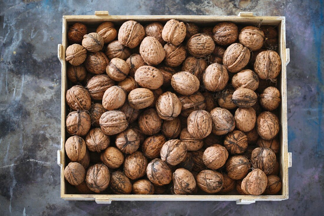 Italian walnuts in a crate