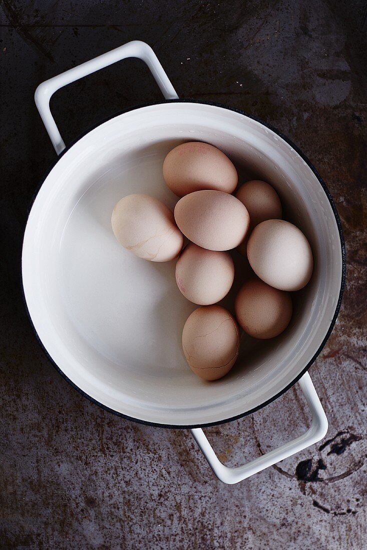 Hard-boiled eggs in a saucepan