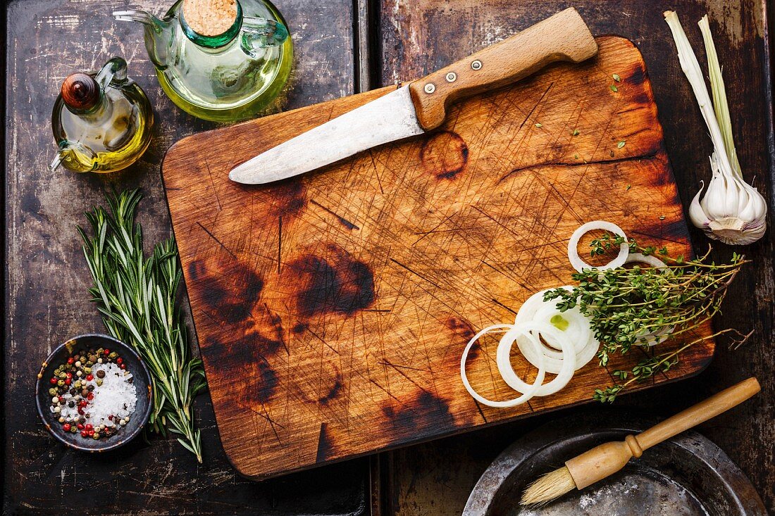Wooden chopping board background with Seasoning and herbs