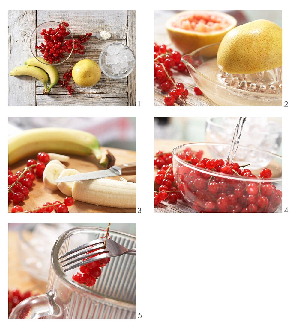 A banana and berry smoothie being made